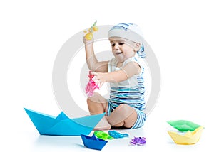 Little child playing with fishing rod toy