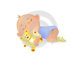 Little child sleeps and hugs with a toy bear