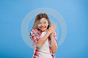 Little child smile excited with new idea stand over blue background. This is the point. Idea solution. Girl cute