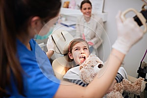 Little child at stomatology. Girl with dentist.Family  Health teeth concept