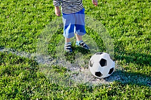 Little child about to kick off