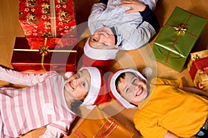 Little children as Santa in red cap