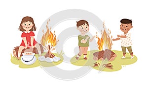Little children camping around bonfire at summer camp. Happy kids cooking and warming themselves by fire cartoon vector