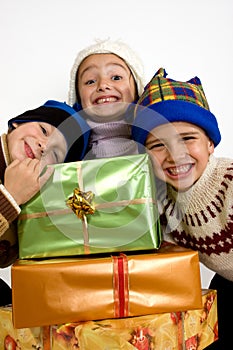 Little children with christmas gifts