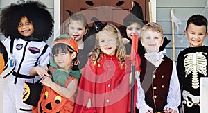 Little children in Halloween costumes