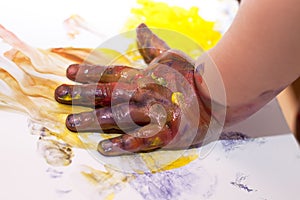 Little Children Hands doing Fingerpainting photo