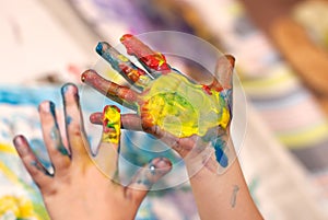 Little Children Hands doing Fingerpainting photo