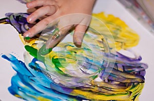 Little Children Hands doing Fingerpainting