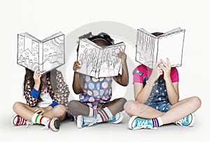 Little Children Reading Story Books photo