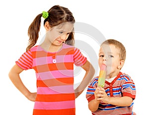 Little children sharing the ice cream