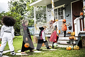 Little children trick or treating photo