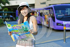 Little Chinese Asian Tourist Girl with map