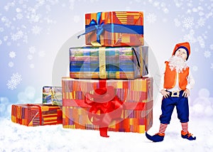 Little christmas elf with big gift boxes