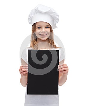 Little cook or baker with blank black paper