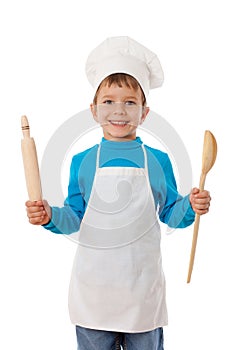 Little cook with ladle and rolling pin