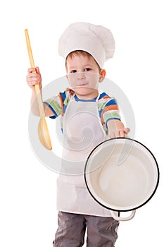 Little cook showing empty white pan