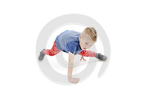 Little cool hip-hop boy in dance. Studio shot.