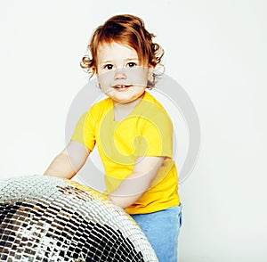 little cute adorable baby girl holding disco ball isolated on white close up, sweet real toddler, lifestyle people