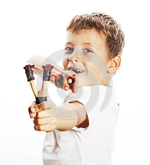 Little cute angry real boy with slingshot isolated