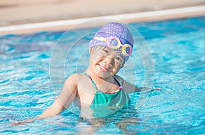 Little cute Asian girl on bikini suit