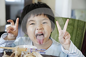 Little cute asian girl eating