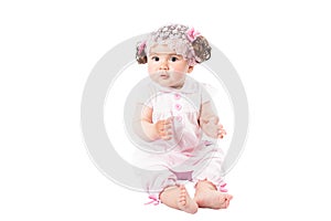 Little cute baby-girl in pink dress isolated on white background