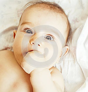 Little cute baby toddler on carpet isolated close up smiling ado