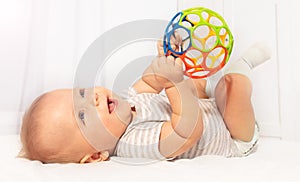 Little cute baby toddler play and hold toy ball