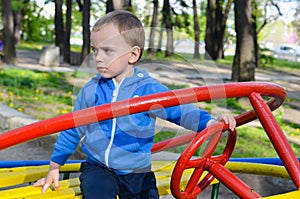 Little cute blond angry boy