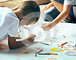 Little cute boy with company painting on birthday party