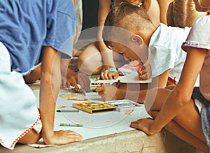 Little cute boy with company painting on birthday