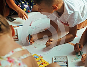 Little cute boy with company painting on birthday party