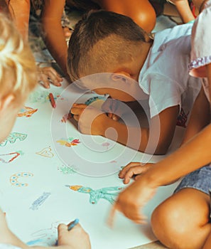 Little cute boy with company painting on birthday party