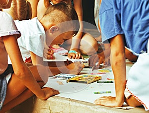 Little cute boy with company painting on birthday party