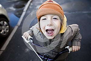 Little cute boy in hammock smiling