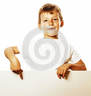 Little cute boy holding empty shit to copyspace close u