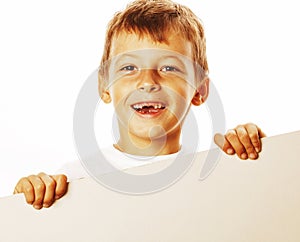 Little cute boy holding empty shit to copyspace isolated close u