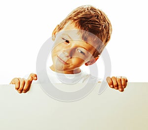 Little cute boy holding empty shit to copyspace isolated close u