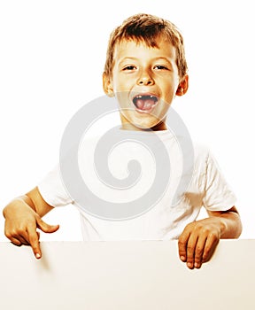 Little cute boy holding empty shit to copyspace isolated close u