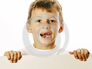 Little cute boy holding empty shit to copyspace isolated close u