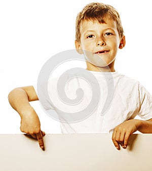 Little cute boy holding empty shit to copyspace isolated close u