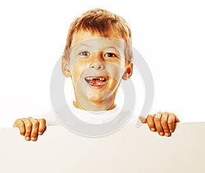 Little cute boy holding empty shit to copyspace isolated close u