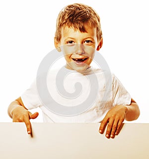 Little cute boy holding empty shit to copyspace isolated close u