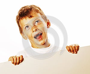 Little cute boy holding empty shit to copyspace isolated close u