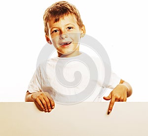 Little cute boy holding empty shit to copyspace isolated close u