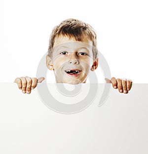 Little cute boy holding empty shit to copyspace isolated close u