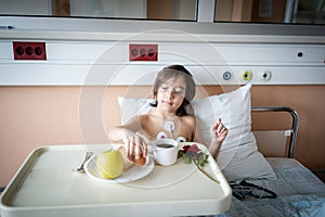 Little cute boy in hospital at bed