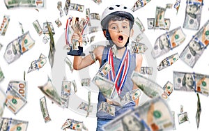 Little cute boy kid wearing bike helmet and winner medals holding winner trophy scared and amazed with open mouth for surprise,