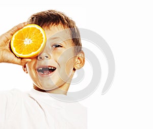 Little cute boy with orange fruit double isolated on white smiling without front teeth adorable kid cheerful