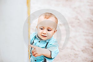 Little cute boy playing outdoor in the park